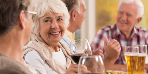 Photo of older women drinking wine