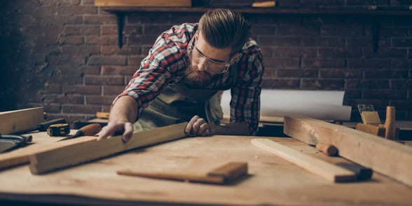 Photo of a man doing woodwork