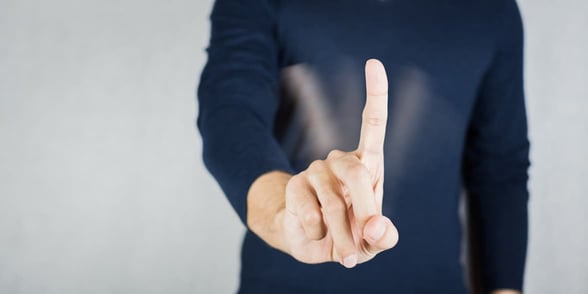 Photo of a man wagging his finger