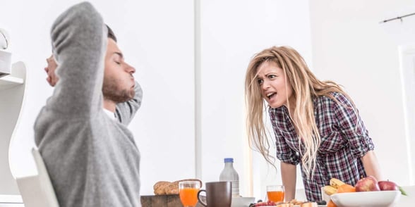 Photo of a woman yelling at a man