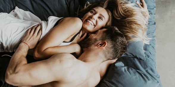 Photo of a couple in bed