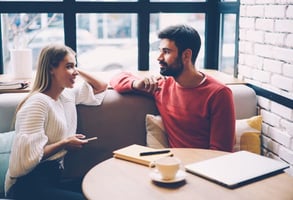 Photo of a couple talking Photo of a couple talking
