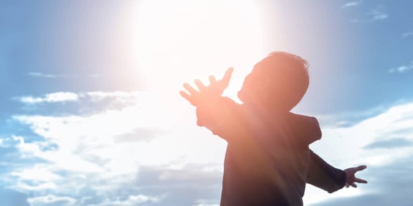 Photo of man with his arms open