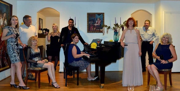 Photo of Natasha hosting an Encounters International party