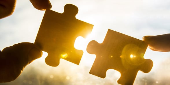 Photo of two puzzle pieces