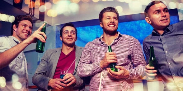 Photo of men at a party
