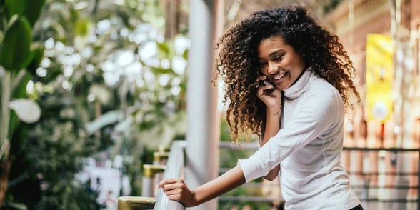 Photo of a woman talking on the phone