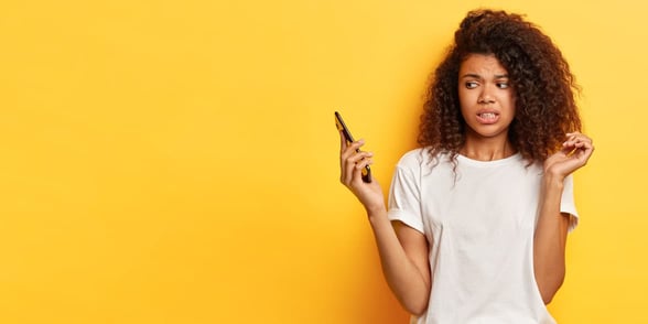 Photo of a woman ignoring a phone call