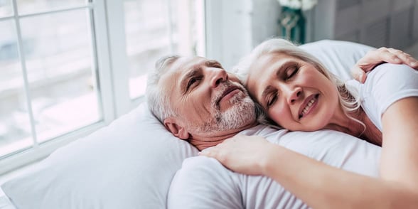 Photo of a couple in bed