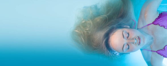 Photo of woman floating at Float House Photo of woman floating at Float House