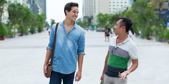 Photo of two gay men talking