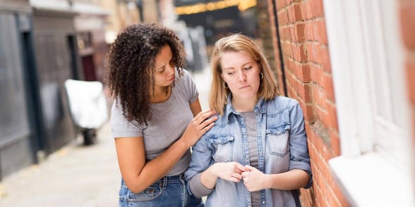 Photo of a sad lesbian couple