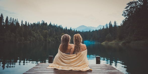 Photo of lesbian couple at a lake Photo of lesbian couple at a lake