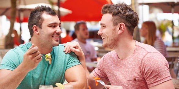 Photo of a gay couple talking Photo of a gay couple talking