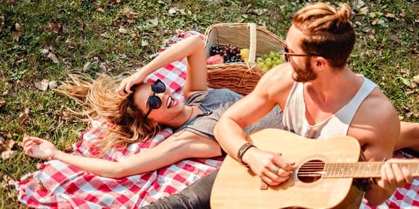 Photo of man playing guitar