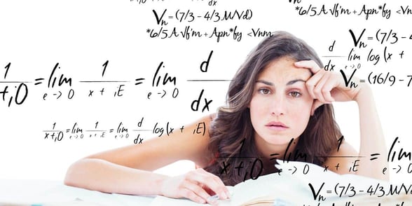 Photo of woman doing math