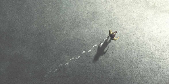 Photo of person with footsteps behind