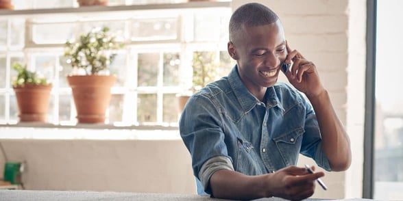 Photo of man talking on the phone
