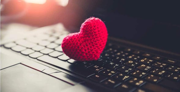 Photo of a computer with a heart on it Photo of a computer with a heart on it