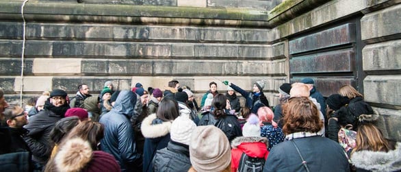 Photo of guide leading a tour on The Potter Trail