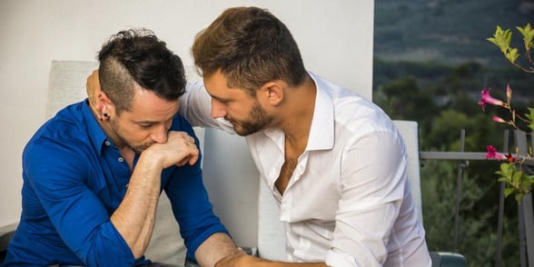 Photo of gay couple talking Photo of gay couple talking