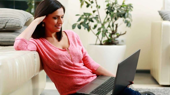 Photo of woman on laptop