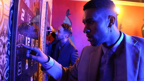 Photo of guests solving Clue Chase puzzles