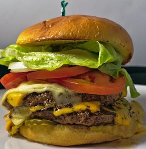 Photo of the saloon's double cheeseburger