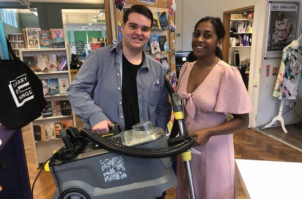 Photo of couple borrowing a carpet cleaner from the Library of Things