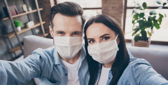 Photo of a masked couple