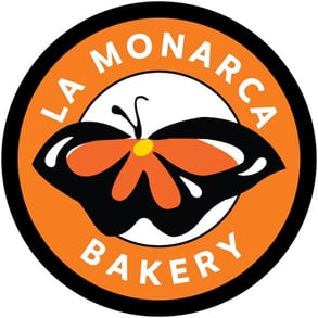 The La Monarca Bakery & Cafe logo The La Monarca Bakery & Cafe logo