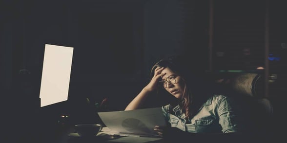 Photo of an overworked woman