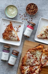 Photo of pizza and spices