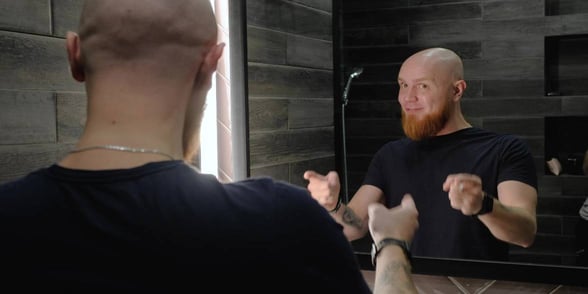 Photo of man talking to himself
