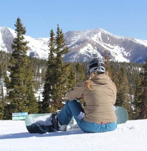 Photo of a snowboarder