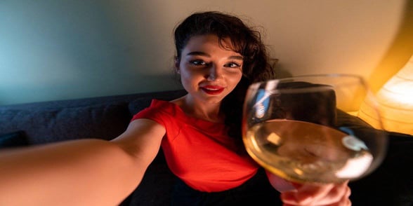 Photo of woman on virtual date Photo of woman on virtual date