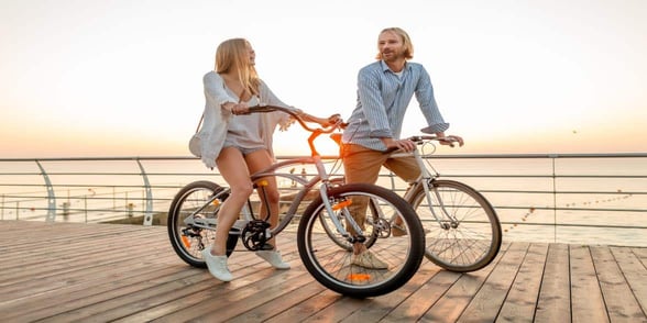 Photo of couple riding bicycles