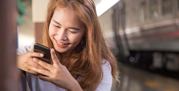 Photo of a woman on her phone