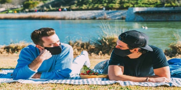 Photo of gay men on outdoor date Photo of gay men on outdoor date