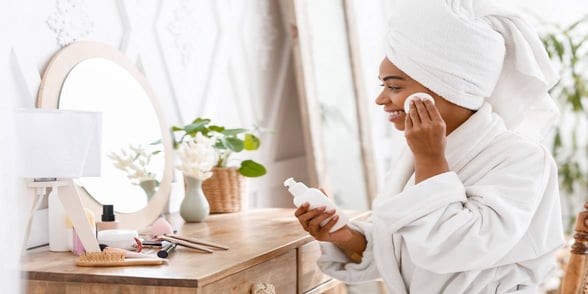Photo of woman washing face Photo of woman washing face