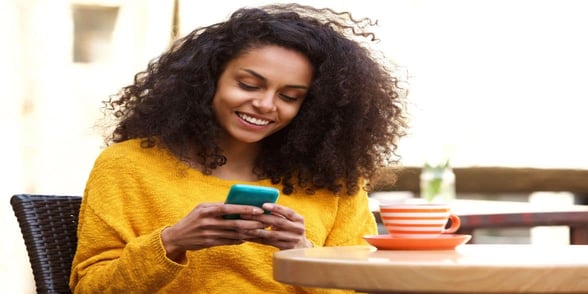 Photo of woman texting