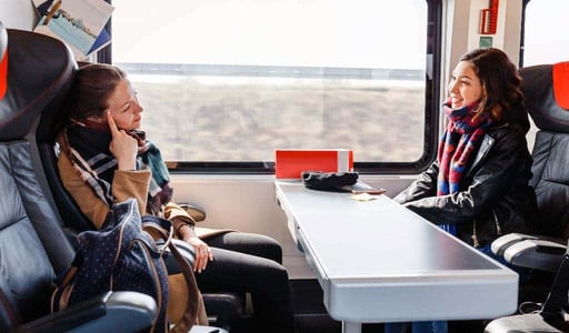 Photo of women on a train Photo of women on a train