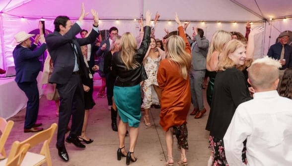 people dancing at wedding