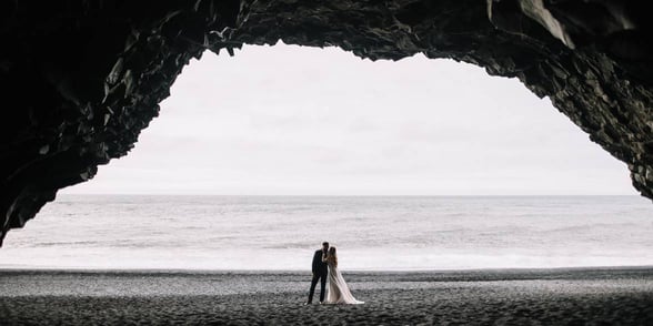 couple standing on beach