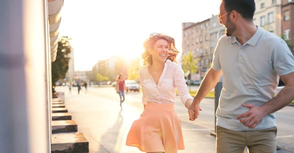 Photo of a couple holding hands
