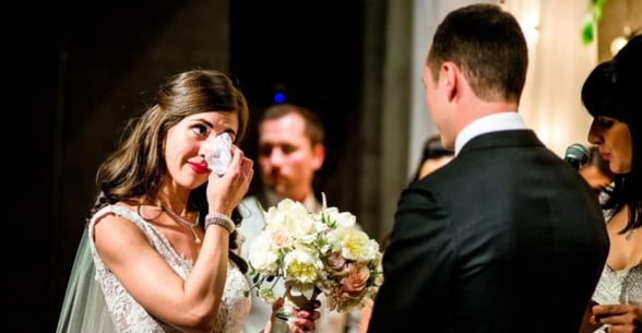 bride crying in marriage ceremony