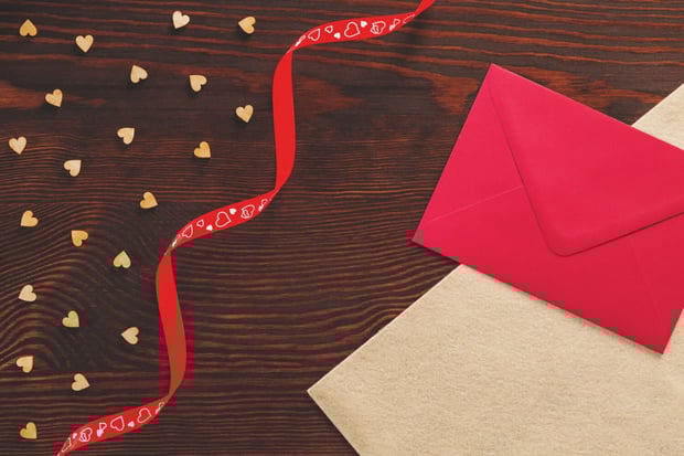 Tabletop with Valentine card and heart decoration
