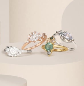 four rings stacked precariously