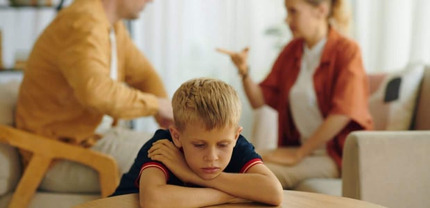 Child upset while parents fight