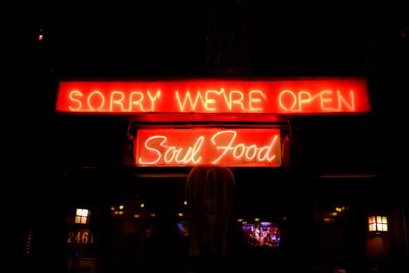 Red neon sign reading 